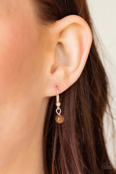 In GLOW Spirits - Brown