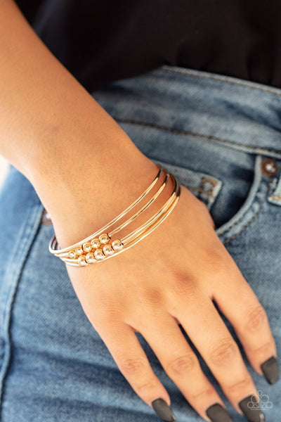 Stack Challenge - Gold Bracelet - Paparazzi